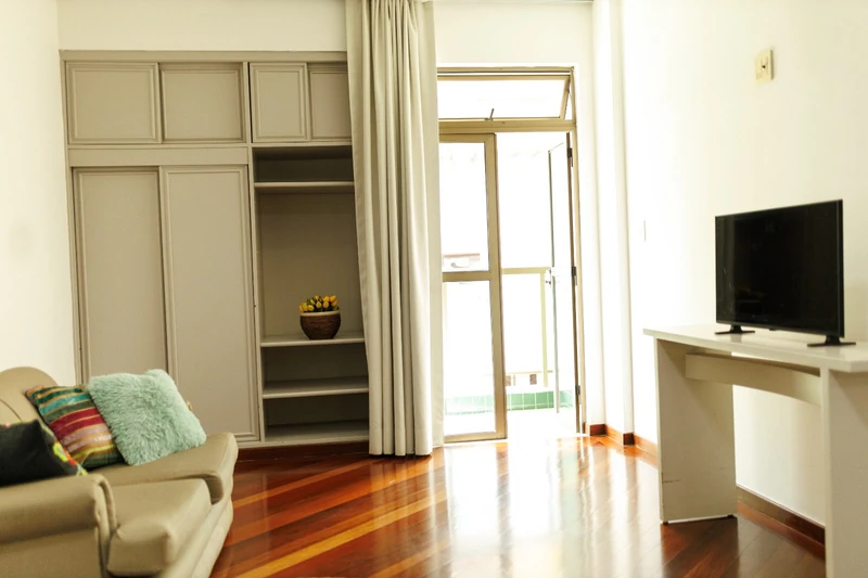 Quarto de um flat da Villa Toscana